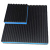 Smaller blue EVA anti vibration pad resting on a larger pad, both with straight ribbed rubber facings