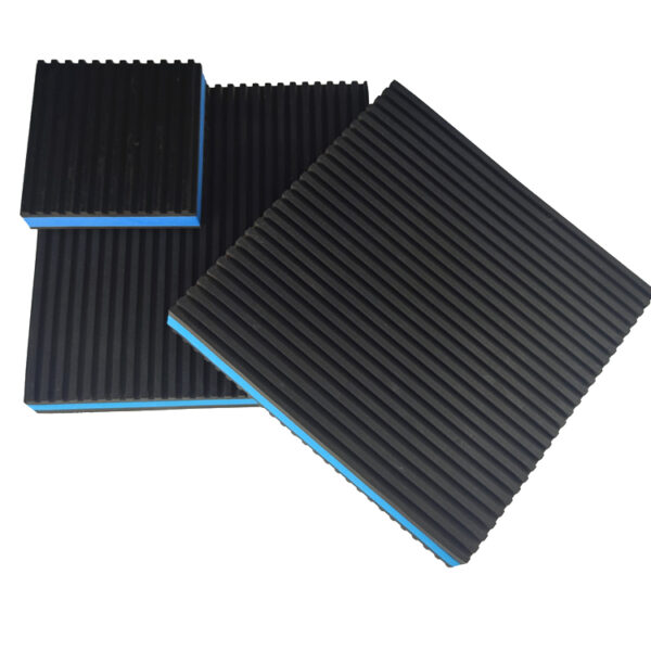 hree blue EVA core anti vibration pads in different square sizes arranged at an angle on a white background