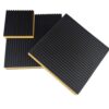 Three yellow EVA core anti vibration pads in different square sizes arranged at an angle on a white background
