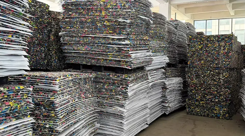 Close view of stacked multicolor rebonded EVA shock pad sheets for artificial grass underlay