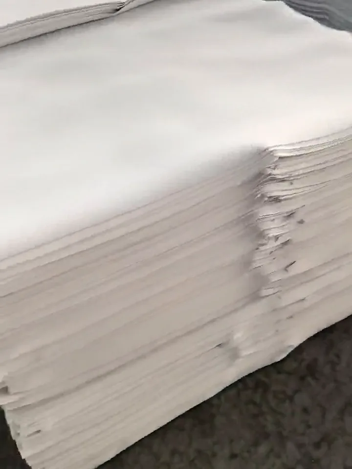 Pilas de planchas de goma EVA blanca con textura de cuadrícula fina para cortar suelas de pantuflas de hotel